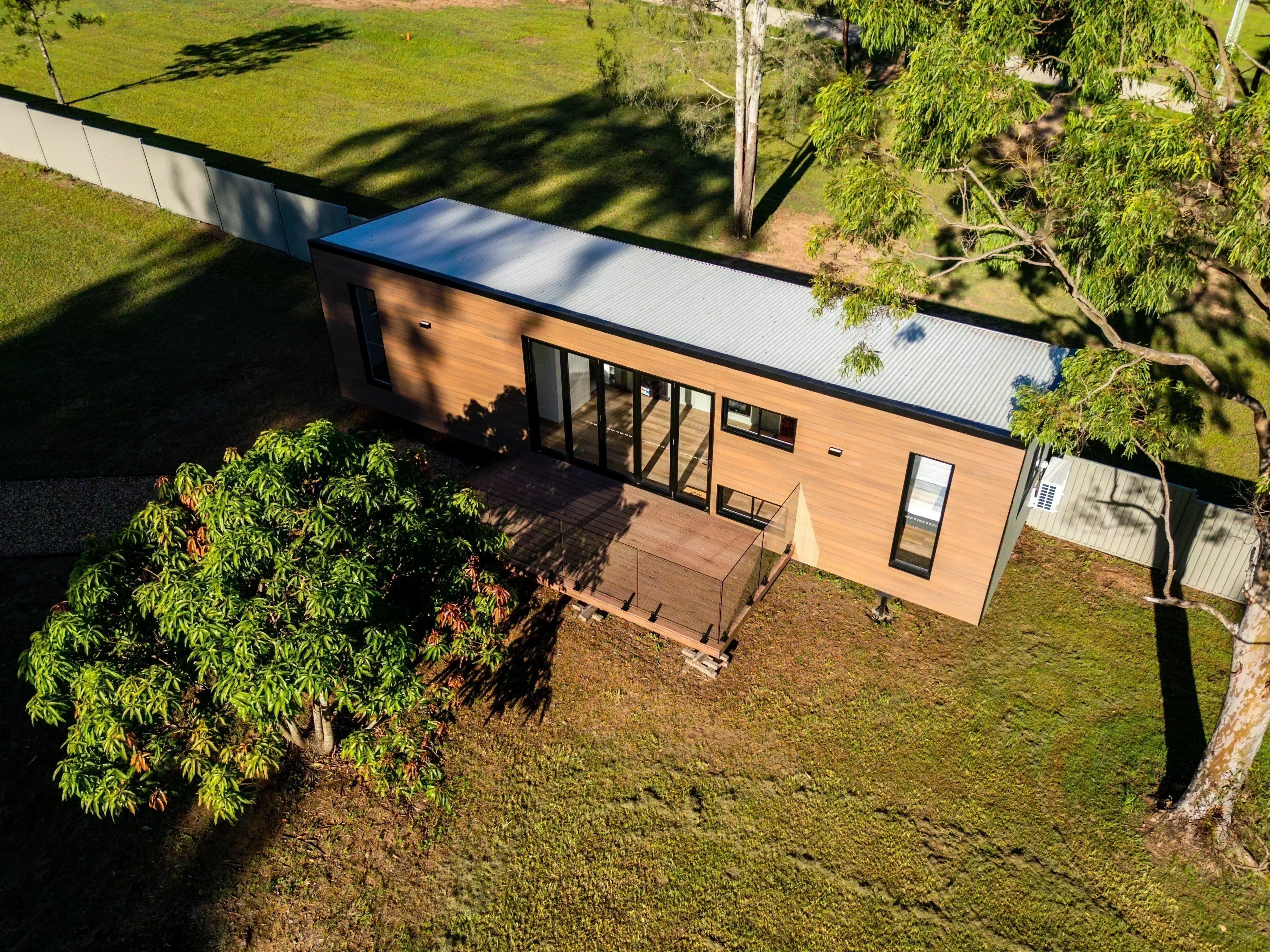 Modern modular home with solar panels and open deck in Australia